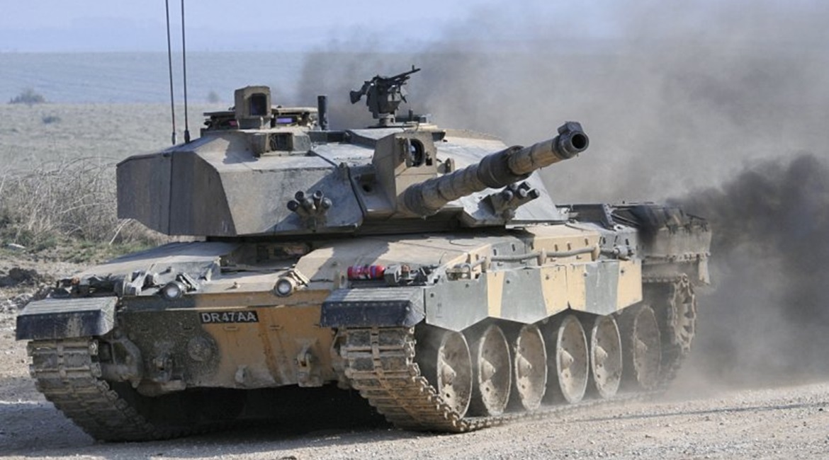 A British Army Challenger 2 MBT showing the protected housing for the Thermal Sighting System mounted externally above the rear of the 120 mm L30A1 rifled gun, and with cover open.