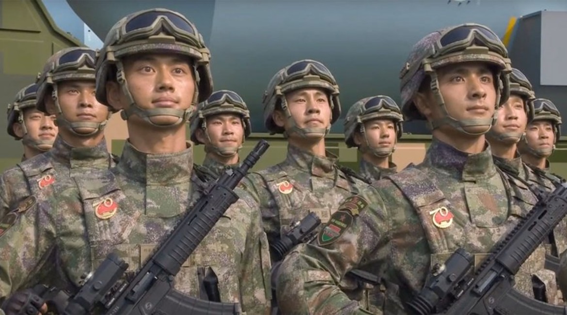 Chinese soldiers carrying a new type of assault rifle during a military parade held at Tiananmen Square in Beijing on 1 October 2019.