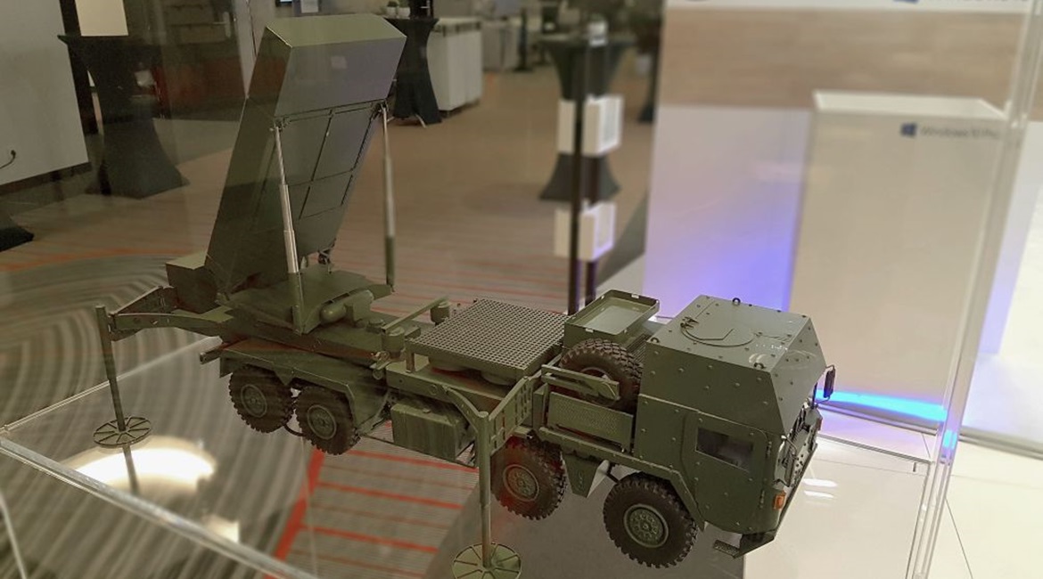 A model of one of the constituent components of the TLVS system being offered for Germany's MEADS programme, displayed at the Berlin Security Conference 2019.