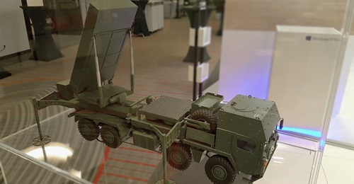 A model of one of the constituent components of the TLVS system being offered for Germany's MEADS programme, displayed at the Berlin Security Conference 2019.