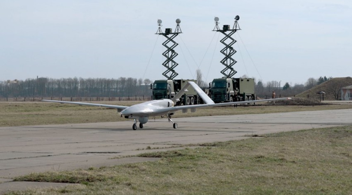 A Ukrainian Bayraktar TB2 is seen with ground control stations in the background. The same Ford 2533 trucks with elevating platforms were seen being unloaded from the cargo ship 
        
         when it docked in Tripoli on 18 May, according...