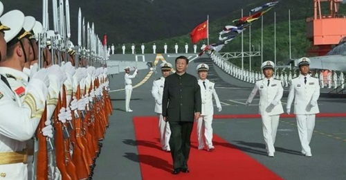 Chinese President Xi Jinping attended the commissioning ceremony of 
        
        , the PLAN's second aircraft carrier, on 17 December at the Sanya-Yulin naval base on Hainan Island.