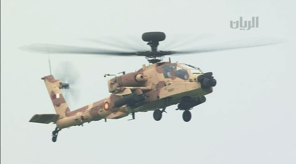 An QEAF Apache Guardian is seen in a still from Qatari TV coverage of the parade.