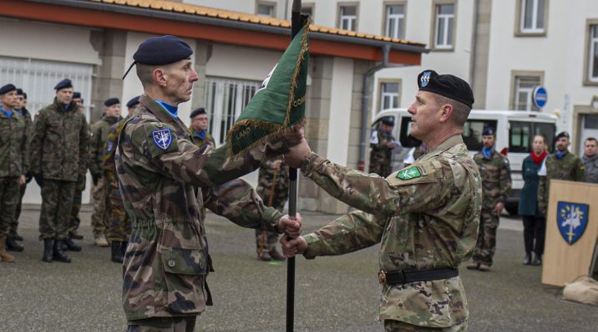 NATO's Allied Land Command Izmir commander, US Army Lieutenant General John Thomson (right), handing the NRF flag over to the Eurocorps commander, French Army Lieutenant General Laurent Kolodziej (left).
