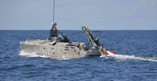 The Mine Countermeasures Unmanned Surface Vessel with the AQS-24B minehunting sonar seen during a sea trial.