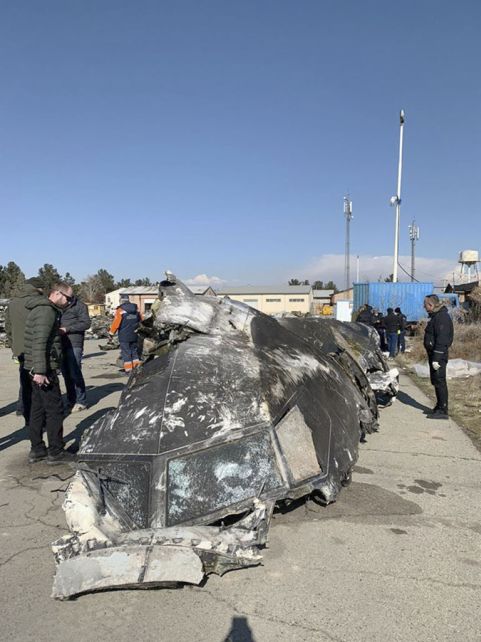 Ukrainian investigators examine wreckage recovered from PS752. (Office of the President of Ukraine)