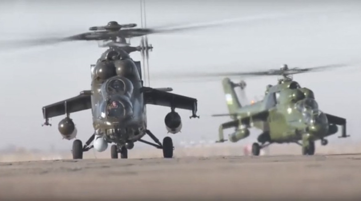 Screenshot of an Uzbekistan news report from 14 January showing at least one new Mil Mi-35M 'Hind' assault helicopter (foreground) that was recently delivered to the country. The helicopter in the background is an earlier-variant Mi-24.