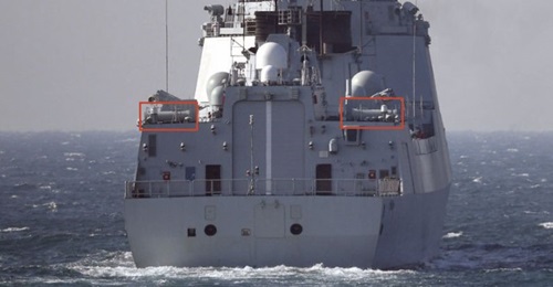 A view of the stern of PLAN Type 052D destroyer
        
        . The warship has been fitted with what appears to be an anti-ship missile countermeasures system.