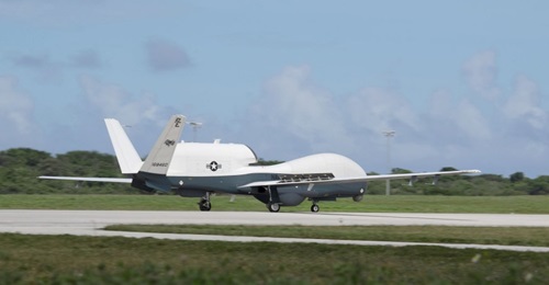 An MQ-4C Triton unmanned aircraft system (UAS) taxis after landing at Andersen Air Force Base for a deployment as part of an early operational capability (EOC) to further develop the concept of operations and fleet learning associated with operating a ...