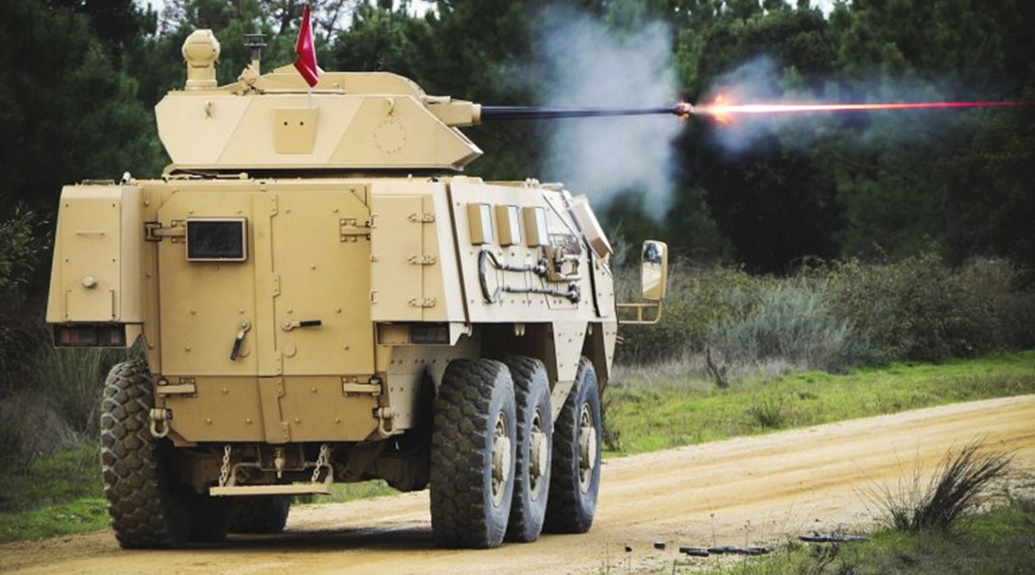 A French Arquus VAB Mk 3 fitted with the PWS Gen 2 engages a target while moving.