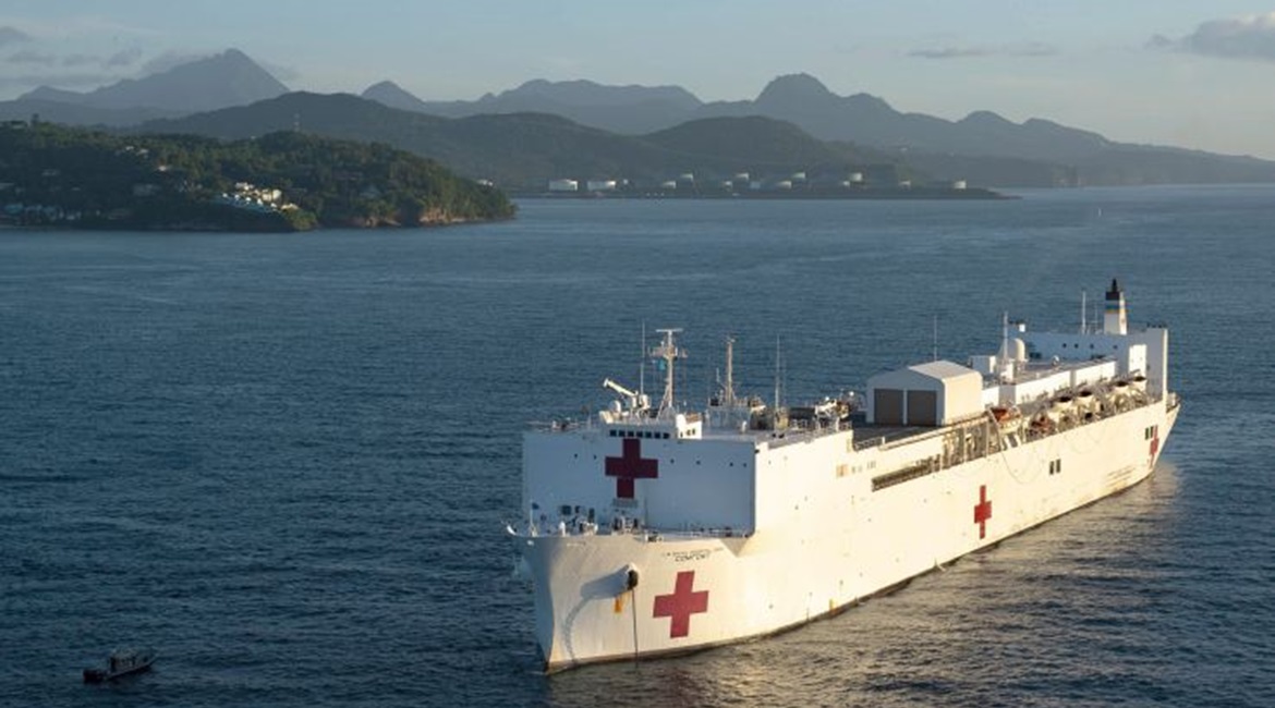 The hospital ship USNS 
        
         is anchored off the coast of Castries, St. Lucia, in September 2019. The Pentagon has announced plans to deploy the ship to New York to help with the Trump administration's COVID-19 response.