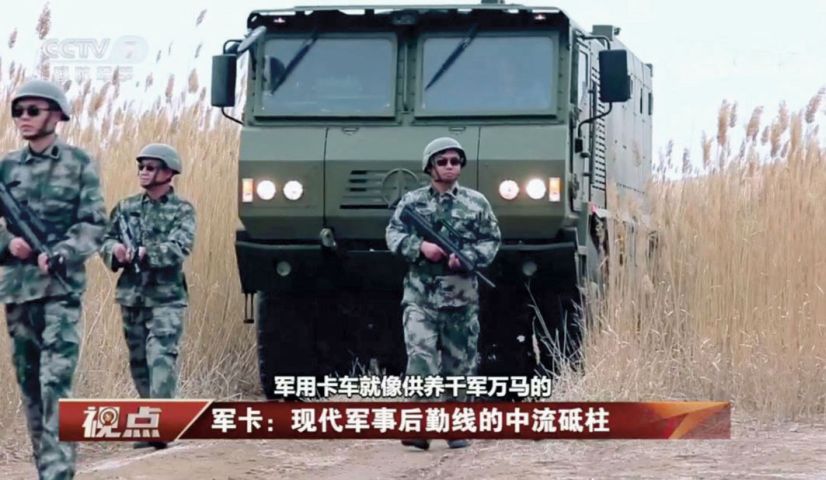 A screengrab of a CCTV 7 report showing the Norinco VP22 armoured transport vehicle being deployed alongside what appear to be PLA infantry troops. (CCTV 7)