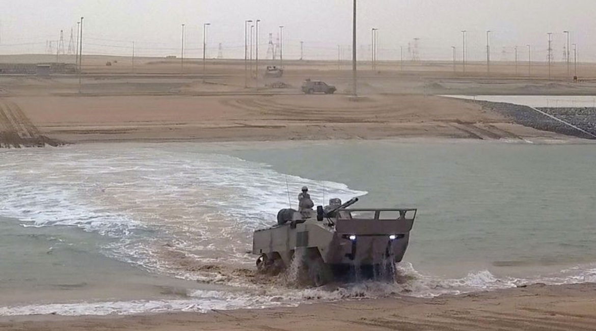 A Rabdan emerges from the canal at the Al-Hamra Combat Training Centre during Exercise 'Native Fury'.