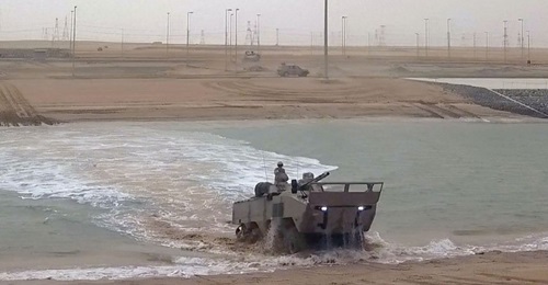A Rabdan emerges from the canal at the Al-Hamra Combat Training Centre during Exercise 'Native Fury'.