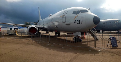 A P-8A assigned to US Navy Patrol Squadron (VP) 10 sits on the flight line at the Singapore Air Show on 11 Feb 2020. Boeing announced that it would suspend production for two weeks at its Seattle, Washington, facilities, including work on the P-8A and ...