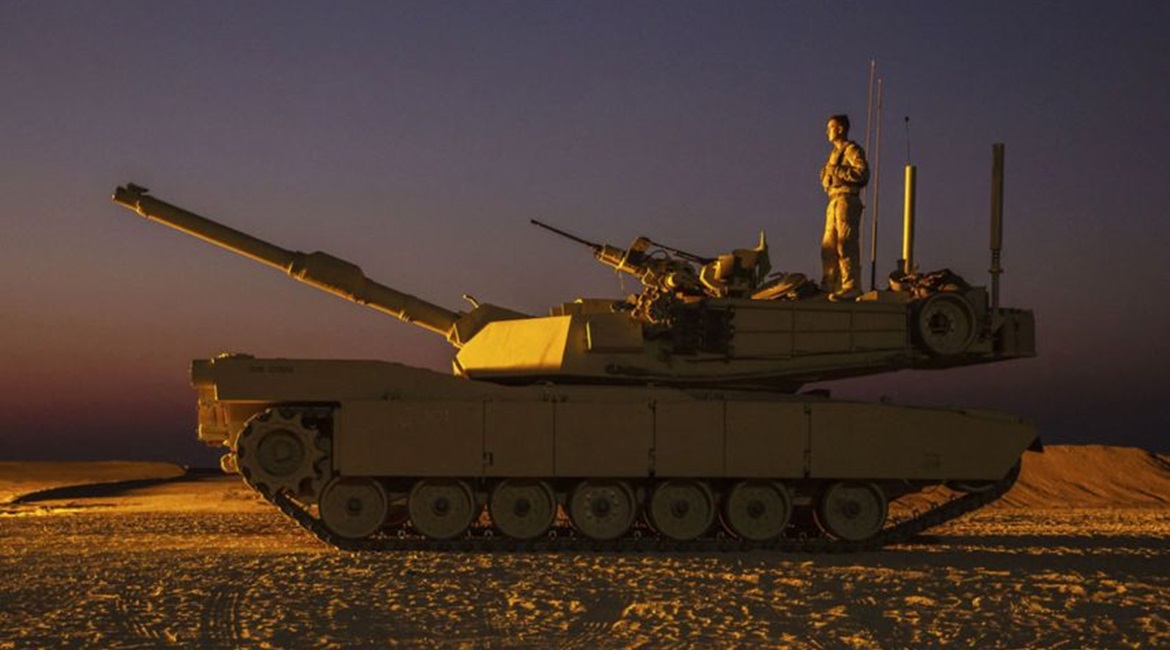 Corporal Chance Marone, an M1A1 Abrams crewman assigned to India Company, Battalion Landing Team 3/5, 11th Marine Expeditionary Unit stands atop an M1A1 Abrams tank in September 2019. The USMC is planning to scrap its tank battalions in the coming year...