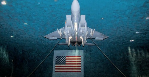 An F-15E Strike Eagle fitted with the EPAWSS electronic defensive aids system in the Benefield Anechoic Facility on Edwards Air Force Base, California.
