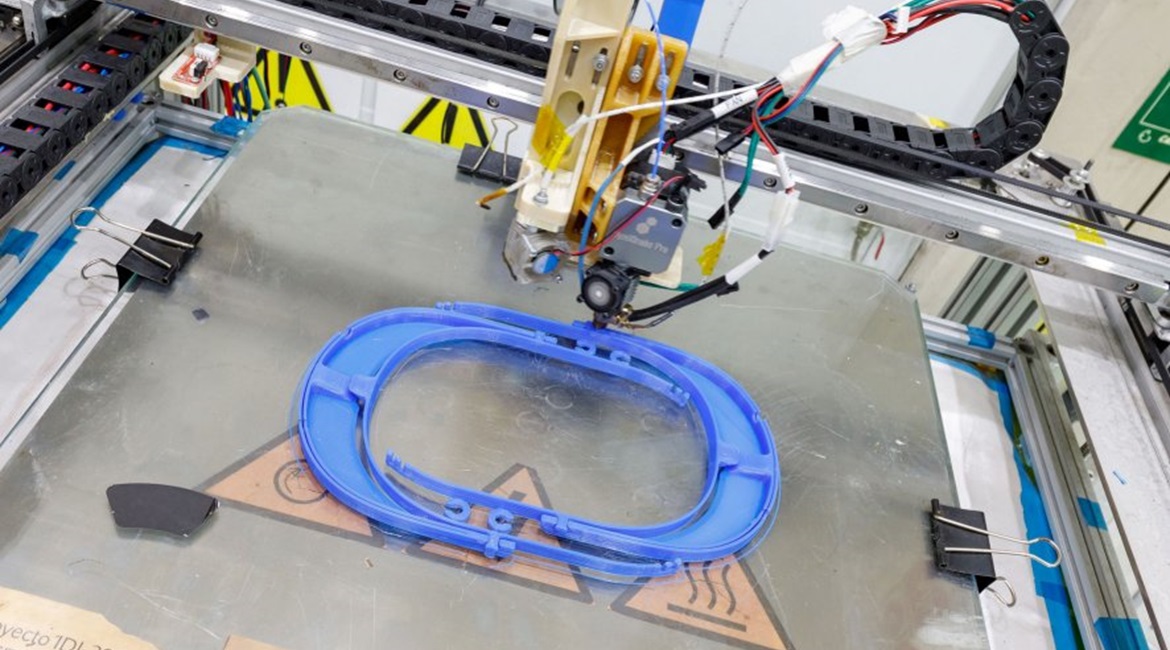 A 3D printer at an Airbus site in Spain makes frames for protective face shields