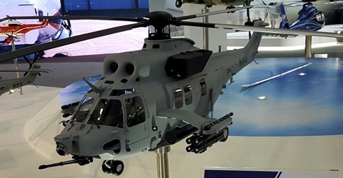 A model of the KAI Surion MAH at ADEX 2019 shows the 20 mm Gatling gun and EO/IR sensor in the nose and the stub-wing-mounted hardpoints