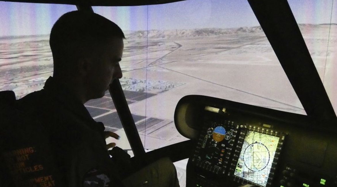 USMC pilot Lieutenant Colonel Lucas Frank takes the new CH-53K Containerized Flight Training Device (CFTD) simulator for a test drive. The marines took delivery of the CFTD on 14 April 2020.