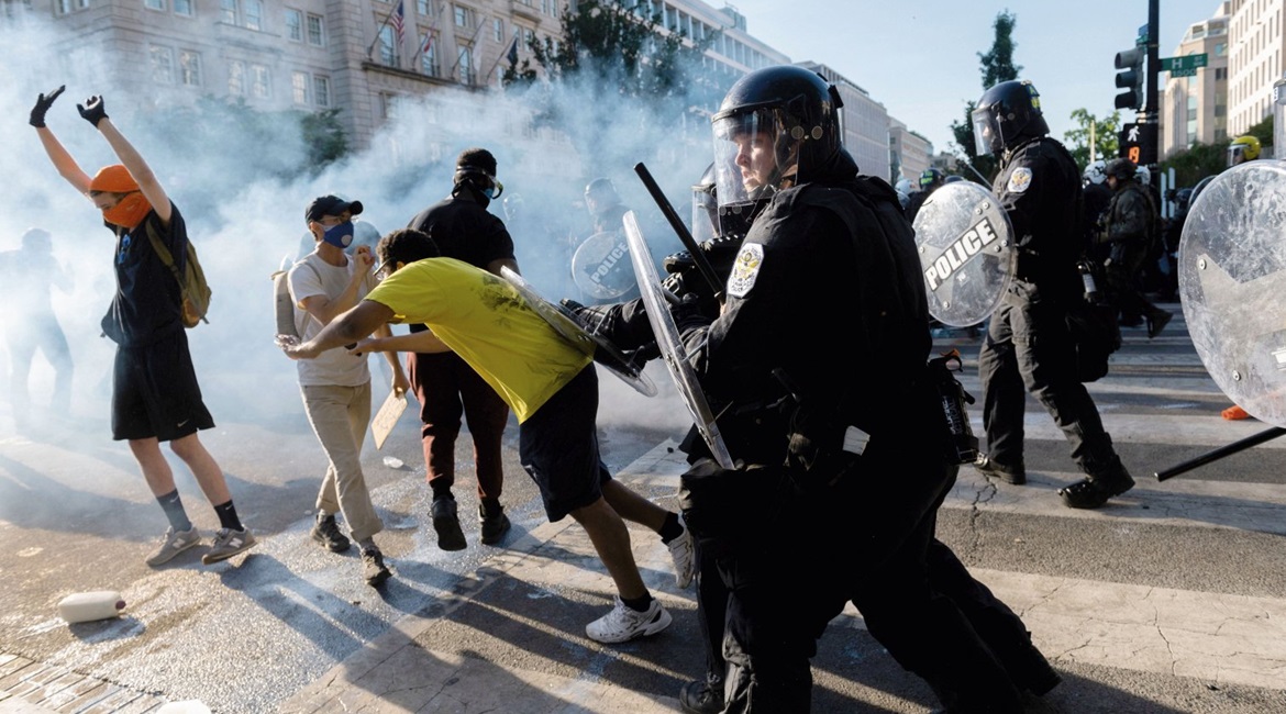 United States Park Police push back protesters near the White House in Washington, DC, on 1 June 2020. External influences on the protests appeared to be opportunistic rather than centrally directed, according to the US Department of Homeland Security.