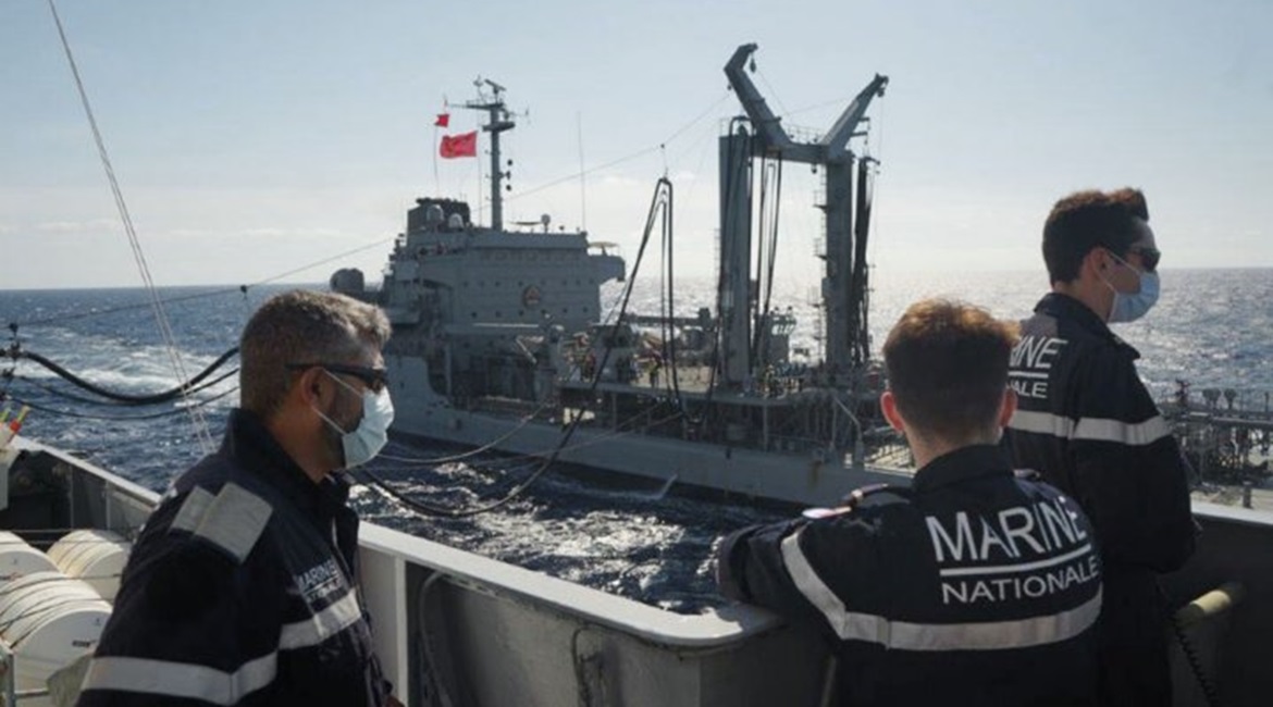 The Turkish tanker 
        
         refuels the French frigate 
        
         off Libya on 4 June.
