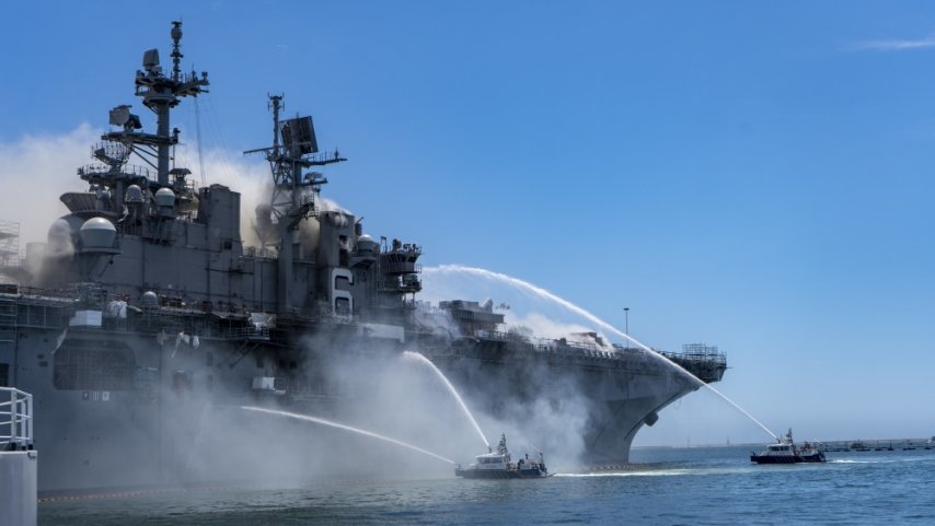 Port of San Diego Harbor Police Department boats combat a fire on board USS
Bonhomme Richard
(LHD 6) at Naval Base San Diego on 12 July.
(Credit: US Navy)