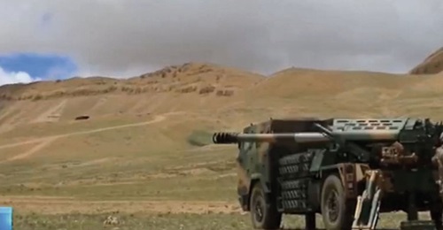 A screengrab of CCTV 13 footage released on 10 August showing a new 4×4 SPH fitted with what has been reported to be a 122 mm gun.