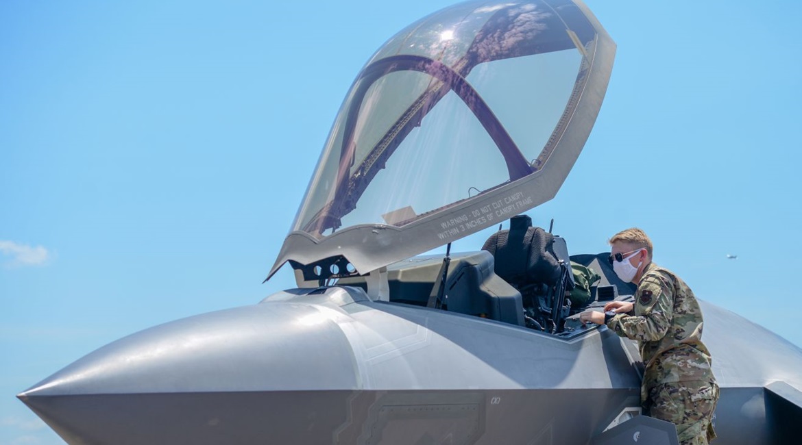 A member of the Columbus Air Force Base Fire Department inspects the interior of an F-35A on 7 August 2020 at Columbus AFB in Mississippi. The Pentagon potentially overpaid USD10.6 million in performance-incentive fees by not independently collecting a...