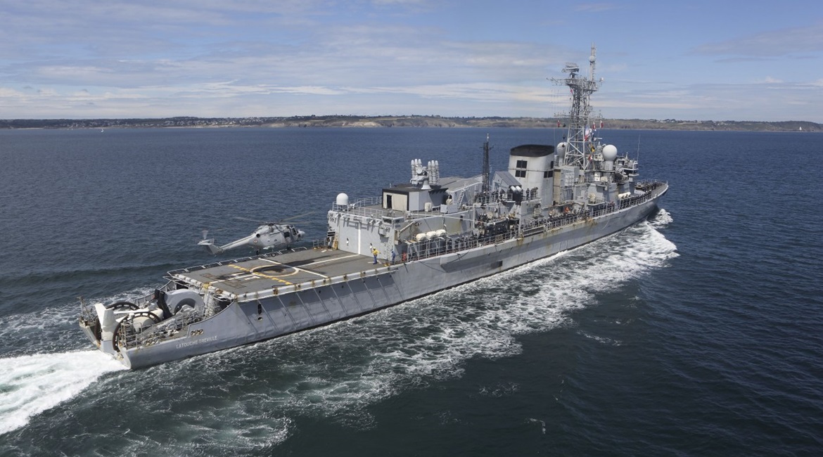 A French Lynx performs its last landing and takeoff from frigate 
        
         off Brest.