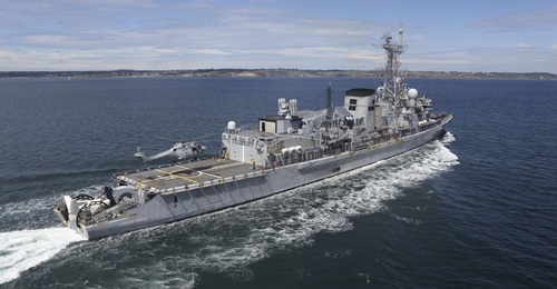 A French Lynx performs its last landing and takeoff from frigate 
        
         off Brest.