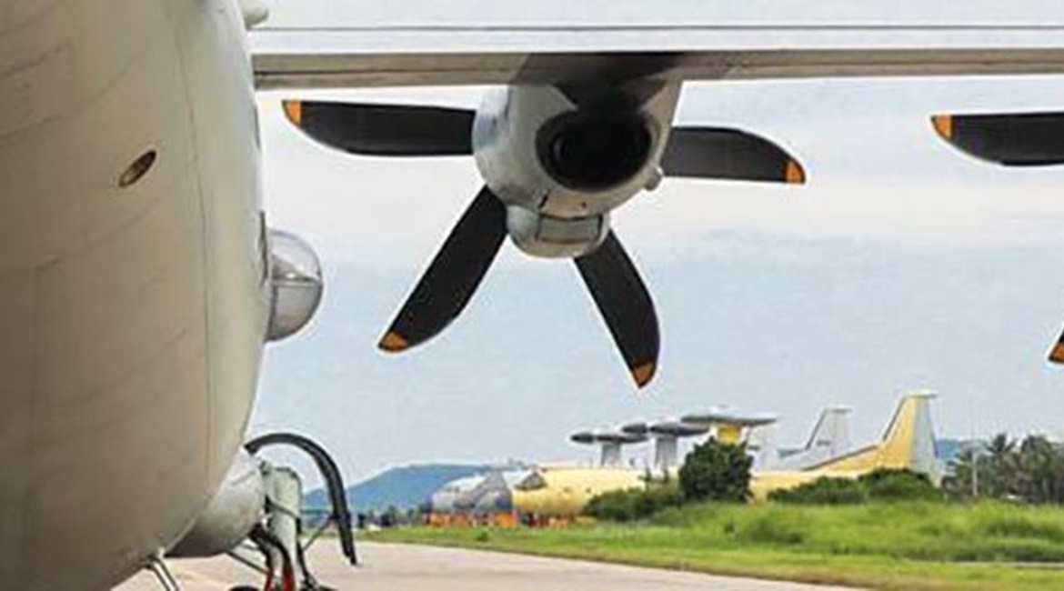 A PLANAF KQ-200 ASW-capable aircraft (foreground) preparing to take part in a flight training exercise on 19 August. A KJ-500 AEW&C aircraft painted in yellow primer and fitted with an IFR probe can be seen in the background parked alongside other airc...