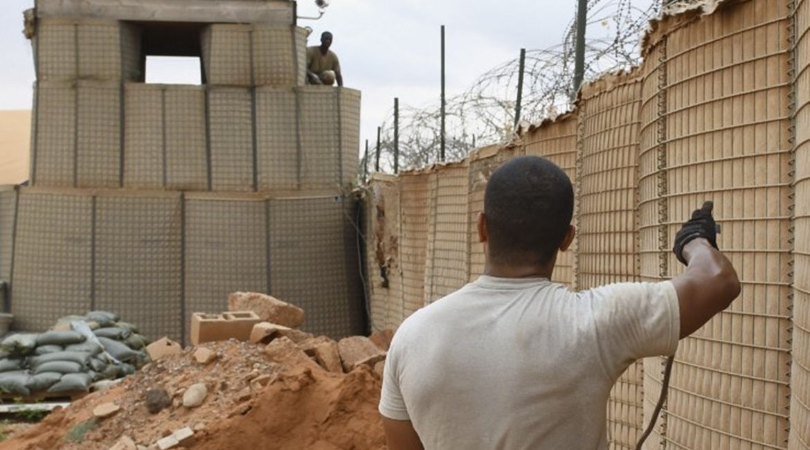 Existing Hesco barriers and a fighting position are seen at an 768 EABS compound in October 2019.