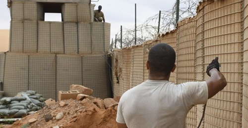 Existing Hesco barriers and a fighting position are seen at an 768 EABS compound in October 2019.