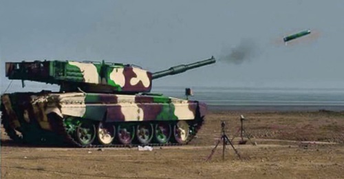 An Arjun MBT is seen here test-firing a locally developed laser-guided anti-tank missile at a firing range in Ahmednagar, western India.