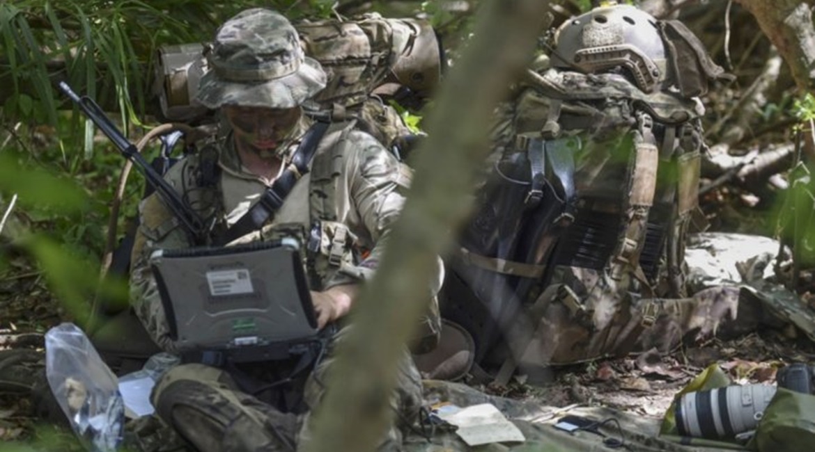 A US Air Force Special Operations Weather Technician sends intelligence during a 31 October 2017 field exercise. Pentagon officials are seeking new spectrum bandwidth solutions for 5G communications on civilian and military mobile networks.
