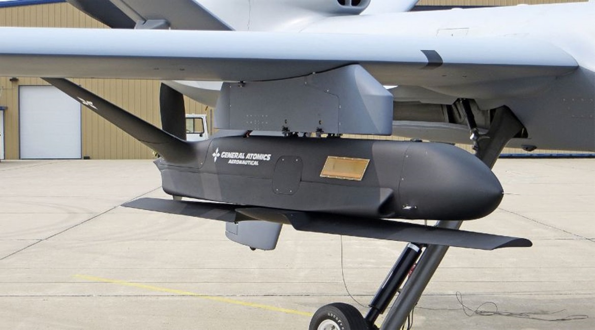 The Sparrowhawk demonstrator seen mounted on a MQ-9A Reaper UAV with its main wing folded for carriage.