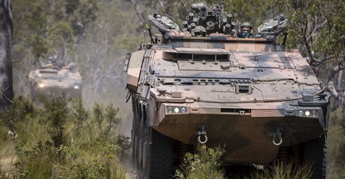 Soldiers from the 2nd/14th Light Horse Regiment of the Queensland Mounted Infantry conduct cross-country training in new Boxer armoured vehicles at the Wide Bay Training Area in Queensland.