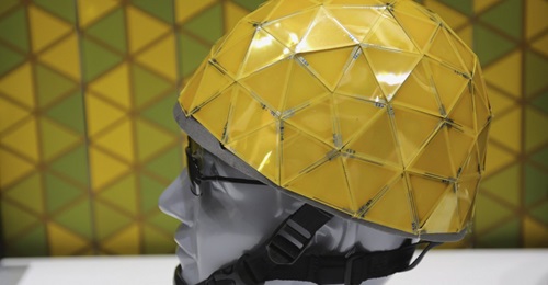 A prototype of an electrochrome helmet that switches colour depending on the environment.