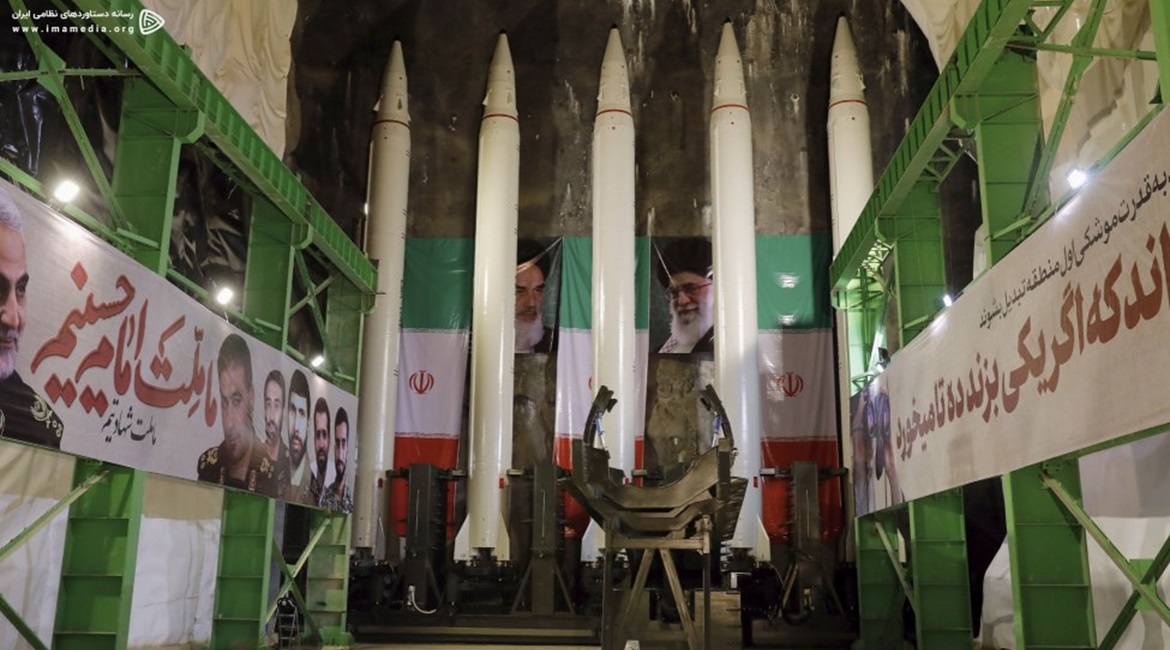 A still from the video shows five Emad ballistic missiles loaded on to the rail launcher in an underground facility, with the erector in the foreground.