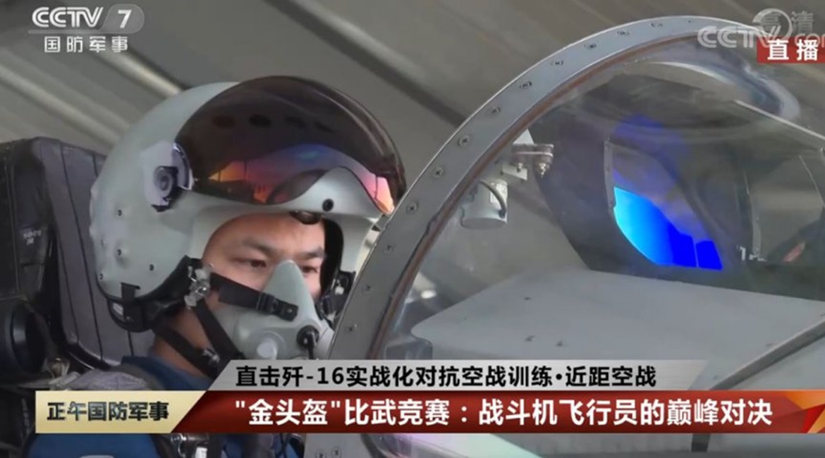 A still from CCTV 7 footage released on 11 November showing the pilot of a PLAAF J-16 fighter aircraft wearing what appears to be a new helmet featuring an HMDS.