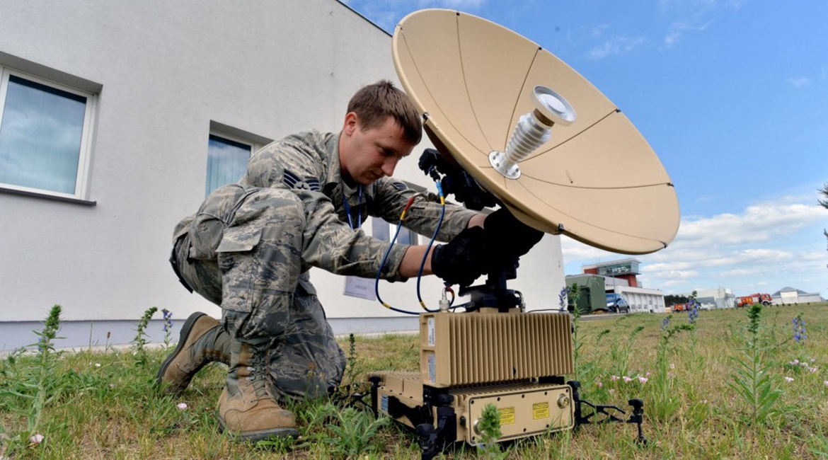 A US Air Force satellite communications technician with the 1st Combat Communications Squadron calibrates a L3 Panther during Baltic Operations 2015 at Powidz Air Base, Poland
