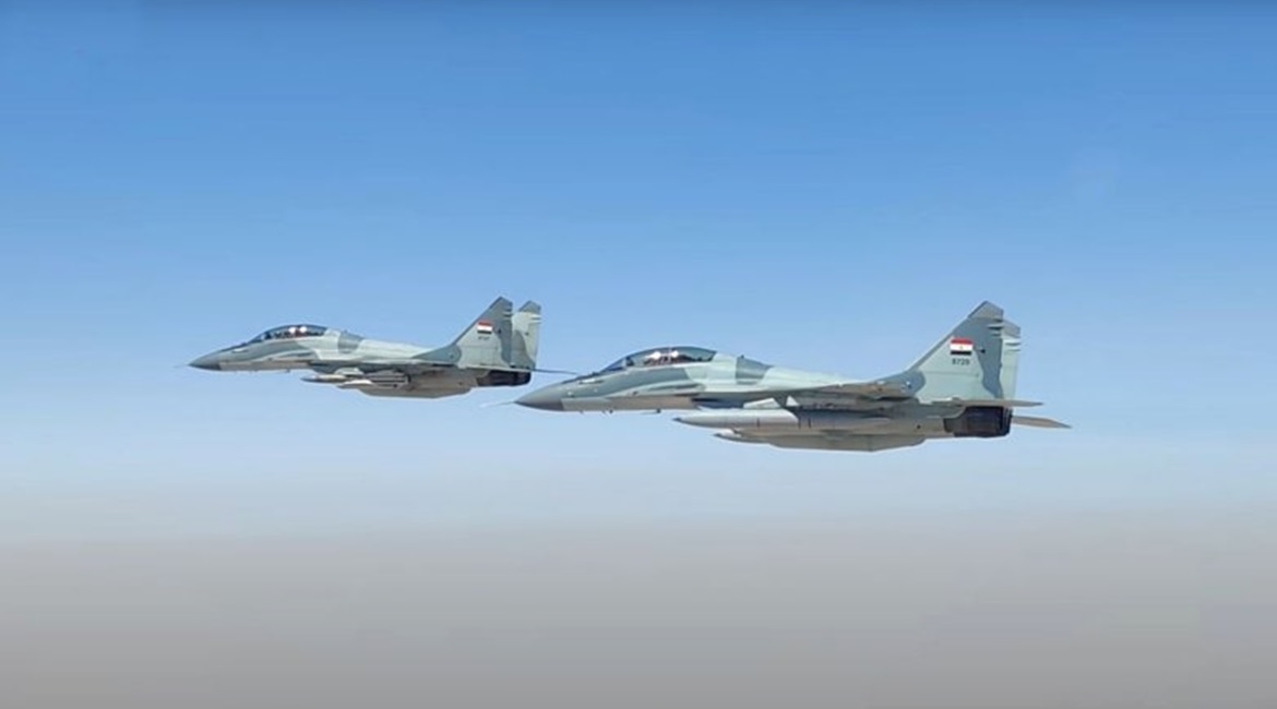 Two MiG-29M2 multirole fighters, one carrying a Kh-31 supersonic air-to-surface missile in a still from the Exercise 'Eagles of the Nile 1' video.