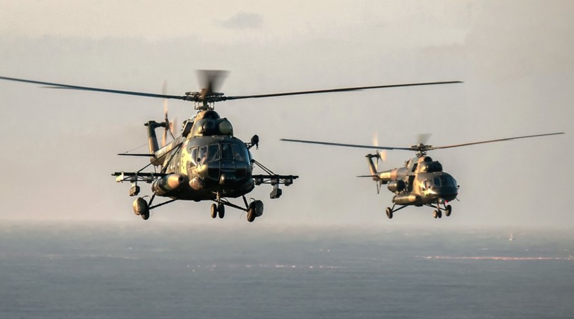 Two PLAGF Mi-171-series multirole helicopters during a training exercise on 11 November. One of the rotorcraft (foreground, left) is equipped with what appear to be ECM pods under its stub wings.