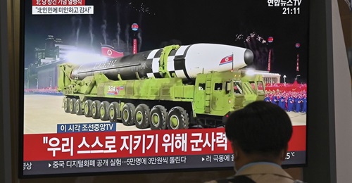 The Hwaseong-16 is shown on a television news broadcast at a railway station in Seoul, South Korea, of a military parade commemorating the 75th anniversary of North Korea's ruling Workers' Party held in Pyongyang on 10 October 2020. The new missile is ...