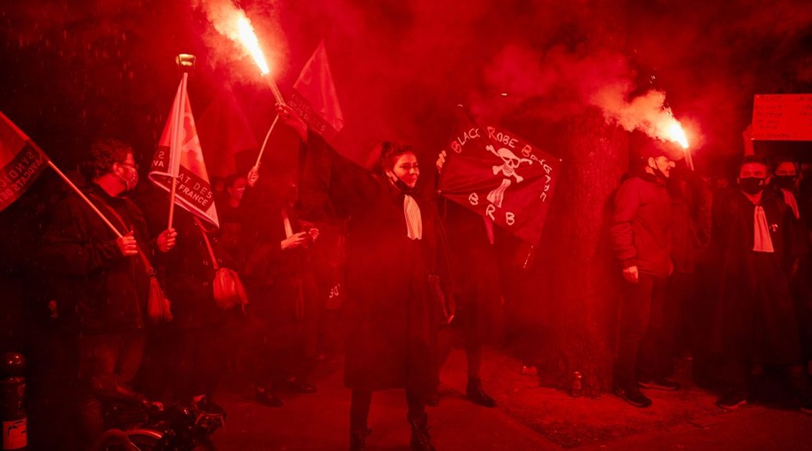 Lawyers and journalists protest outside the National Assembly against the French government's proposed global security law on 17 November 2020 in Paris, France. The protesters included activists, reporters, and unions concerned that Article 24 of the b...