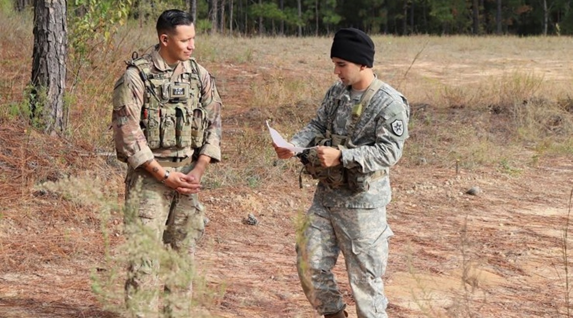 Sergeant First Class Jeremiah Velez, left, an advisor with 3rd Squadron, 1st SFAB, works with a simulated foreign partner during a field training exercise in October 2019 at Fort Benning, Georgia. Soldiers from the 1st SFAB will head to Honduras in Jan...