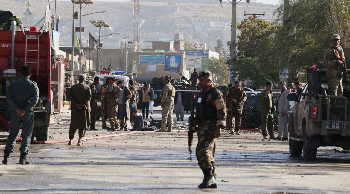 Afghan security forces inspect the scene of a car bomb explosion in Kabul on 27 October that resulted in at least three people being killed and 13 others wounded. US lawmakers have included provisions in the final version of the fiscal year 2021 defens...