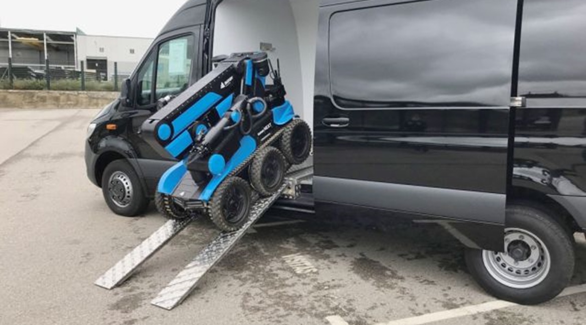 An aunav.NEXT EOD robot being deployed from a aunav.VAN command and control vehicle.