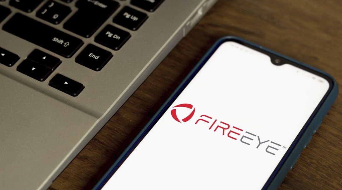 The FireEye corporate logo is shown on a smartphone on 7 July 2020. FireEye was the subject of a sophisticated cyber intrusion that subsequently revealed operations against US government entities, among others.